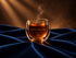 Infusion Blue Obscura Hazellia For Him, création masculine boisée et ambrée présentée dans un mug signature sur satin bleu nuit.

